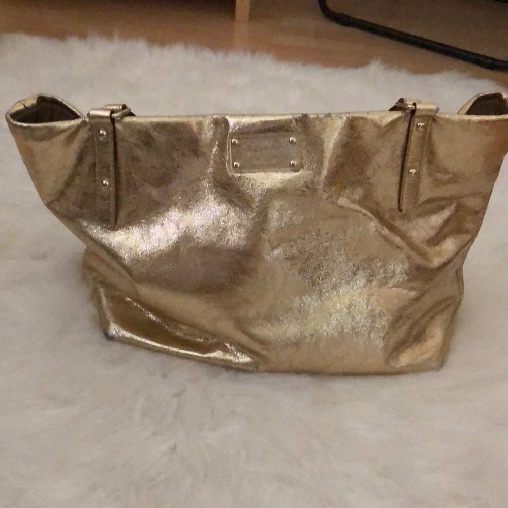 Gold Kate Spade hand bag
